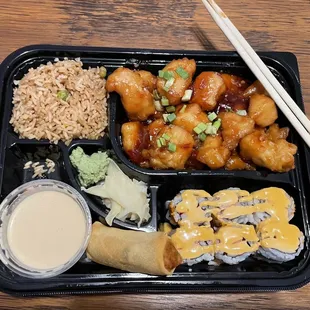 Wild Wok Bento Box: (clockwise) fried rice, scallion chicken, Fantasy Roll sushi (fabulous!), spring roll, shrimp sauce, wasabi &amp; ginger