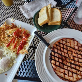 Two eggs over easy, hash  browns, sourdough toast, Hickory Smoked Ham