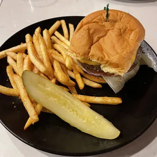 This was my cheeseburger and fries and I had to take it back unfortunately since the middle was raw and cold and the burger was just a mess
