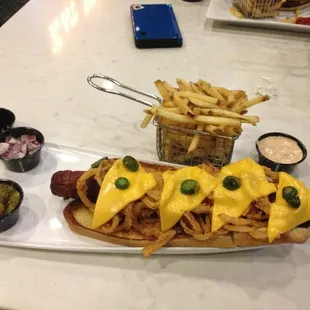 Bacon wrapped footlong,  the weiner is has some serious girth as well as being 12"  buns are butter toasted.  Create your own