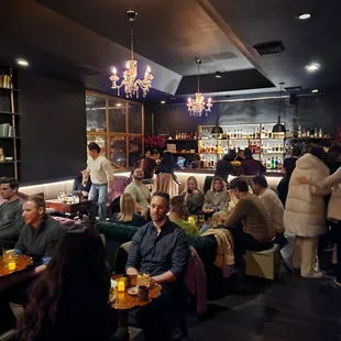 a large group of people sitting at tables