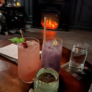 two cocktails on a table