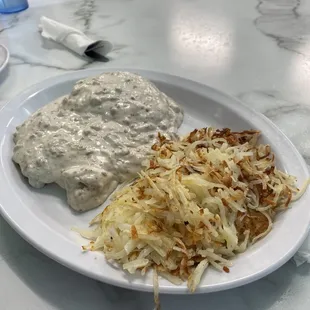 Sausage gravy biscuit w/ a side of hash brown