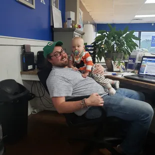 Robert and his son Morrison. We love it when Morrison comes to our store and hangs out with the rest of the family.