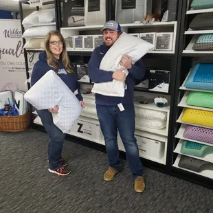 Robert Workman, and Bobbie Penland checking out our new Malouf Pillow rack at Wildcat Mattress. Latex and memory foam pillows!