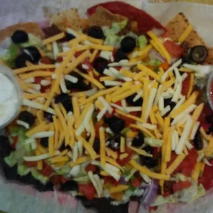 Nacho Supreme -popular feature of Wednesday nite available during all kitchen hours