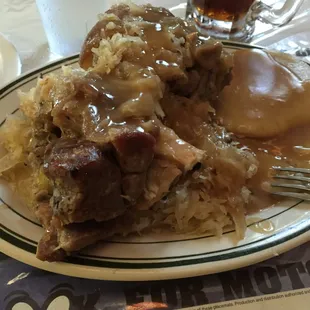 2 Pork hocks, sauerkraut, dumplings with gravy.  The sauerkraut flavor was so good!!