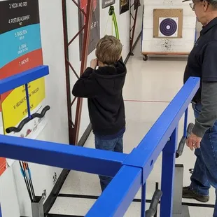 My Grandson shooting his bow
