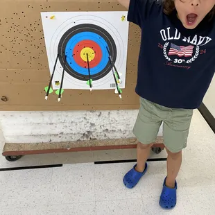 Our 9 year old's first Bullseye. It was his fourth time to the range this summer.
