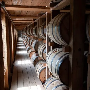 Barrels aging  in a rickhouse.