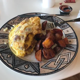 Special spicy omelette: Chorizo, buffalo chicken &amp; pepper jack cheese with potatoes