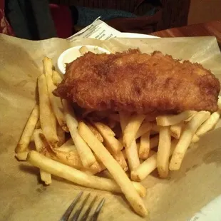 Authentic fish and chips right down to the newspaper!