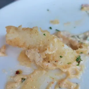 Not so much &quot;simply the best calamari&quot;-soggy breading. both server and mgr confirmed that is their style.