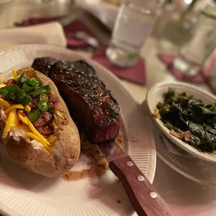 Steak with baked potato and apple bacon collard greens