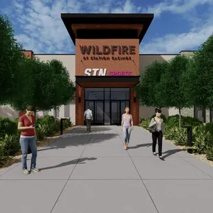 people walking in front of the building