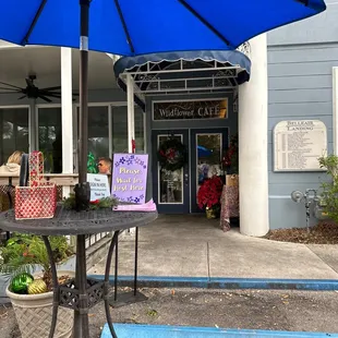 a table with a blue umbrella