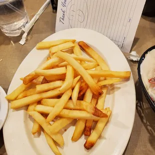 Naturally, Fries came on a separate plate!  Bill in background = Both our same lunches total $20.65.   2/11/2022