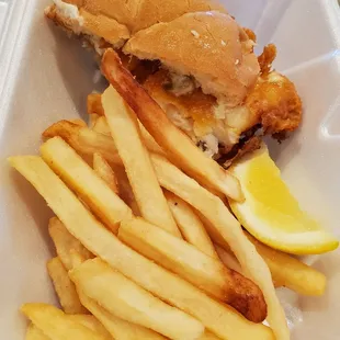 My carry out container with half of Icelandic Beer-Battered Fish Sandwich and Fries. Very filling w soup. 2/11/2022