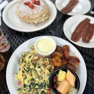 Veggie scramble with a side of hollindaise, wildflower pancakes and turkey bacon.