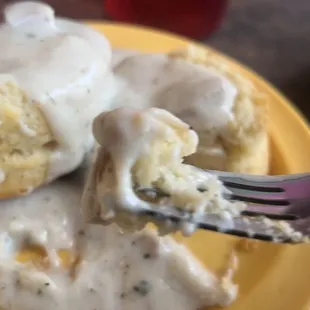 a plate of biscuits and gravy