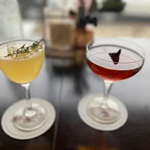 two cocktails on a table