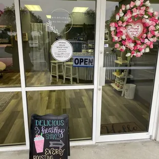 a sign in front of a store