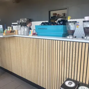 the counter area of a coffee shop