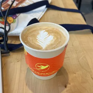 a cup of coffee on a table