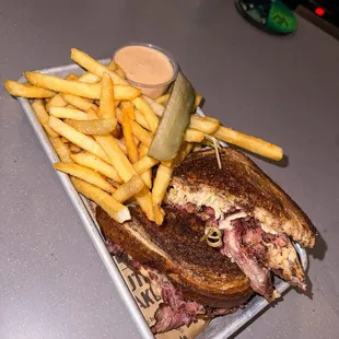 Pastrami on marble rye, tallow fries, side of special sauce, and a pickle of course!
