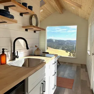 Modern kitchenettes inside the light-filled Valley View cabins