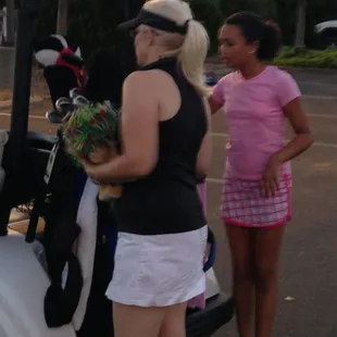 Ann and Delaney packing it up after a round.