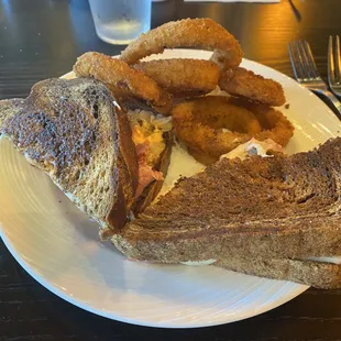 Reuben Sandwich and onion rings.