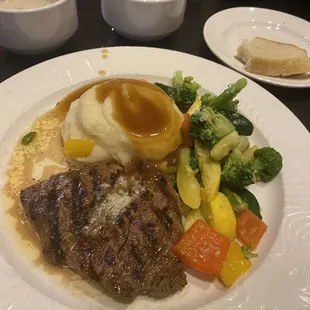 Steak was cooked to order. Mashed potatoes and gravy and veggies were great.