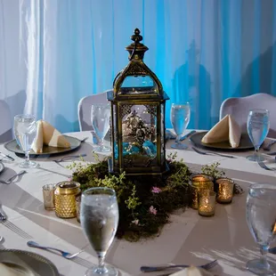 a table set for a wedding reception