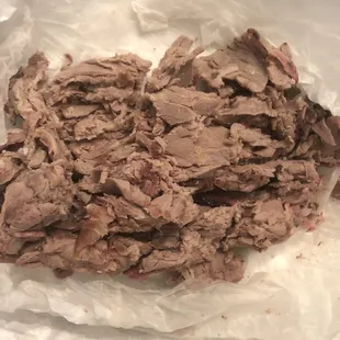 Beef brisket leftovers... aka "sliced brisket". It was cold, bland, no smoke or personality.