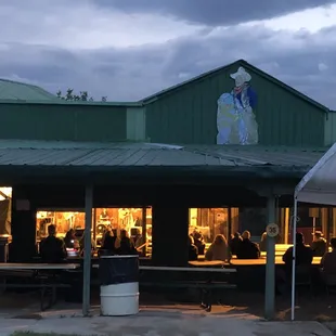 This place captures the imagination.  People congregating for good music and good food.  Excellent bbq