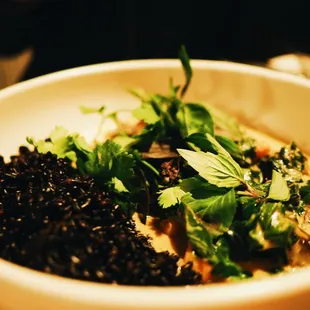 Spicy Yellow Curry (ginger, turmeric, Thai basil, carrot, sweet potato, haricot verts, chard, eggplant, chickpeas, forbidden rice) | $19