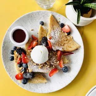 VEGAN FRENCH TOAST: acme sourdough, berries, vegan cream cheese mousse, blackberry agave, toasted hazelnuts