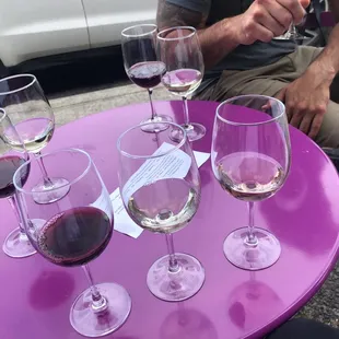 a table with wine glasses on it