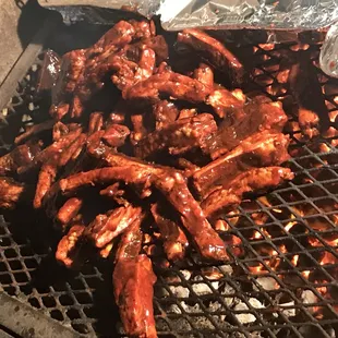 Ribs are on the grill all sauced up