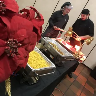 Jason serving up seconds at the catering gig for the Rotary holiday party in Folsom
