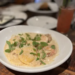 Lobster ravioli with shrimp.