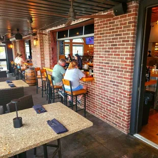 Patio section, with seats at back of bar, seats for 34 back here.