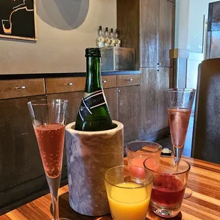 three glasses of wine on a table