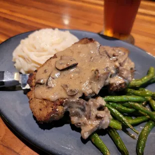 Good blend of beef &amp; pork, generous serving for $19. Promised rosemary in the mushroom gravy, but black pepper dominated.