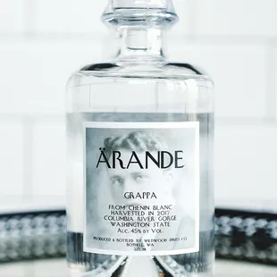 a glass bottle of ariande