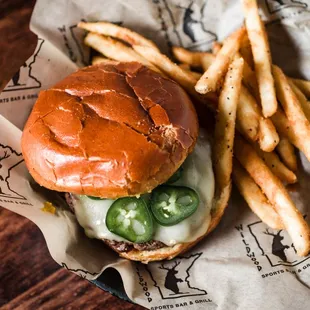 Spicy Peach - CAB Burger grilled and layered with peach preserves, melted white
cheddar and sliced jalapeno on a toasted brioche bun.