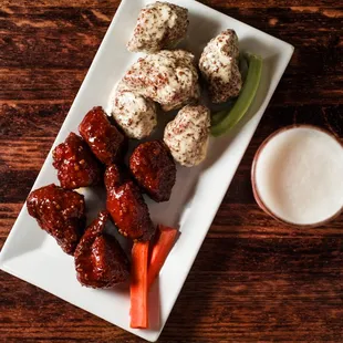 Garlic parmesan and Korean BBQ boneless chicken wings.