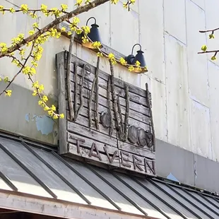 the sign for wildwood tavern