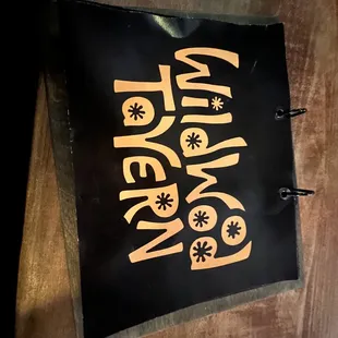 a sign for wildwood tavern